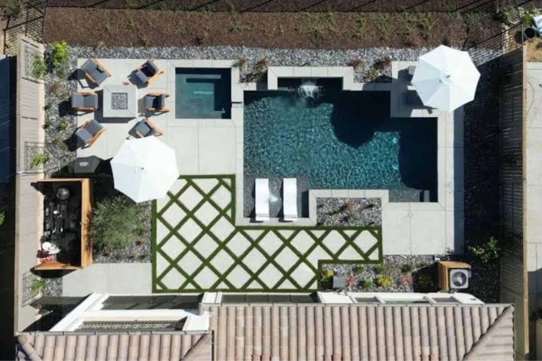Renovated swimming pool with new coping and surrounding hardscape